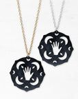 mandala necklace with tarot hand