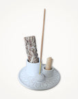 Ceramic incense holder with incense stick, sage and palo santo