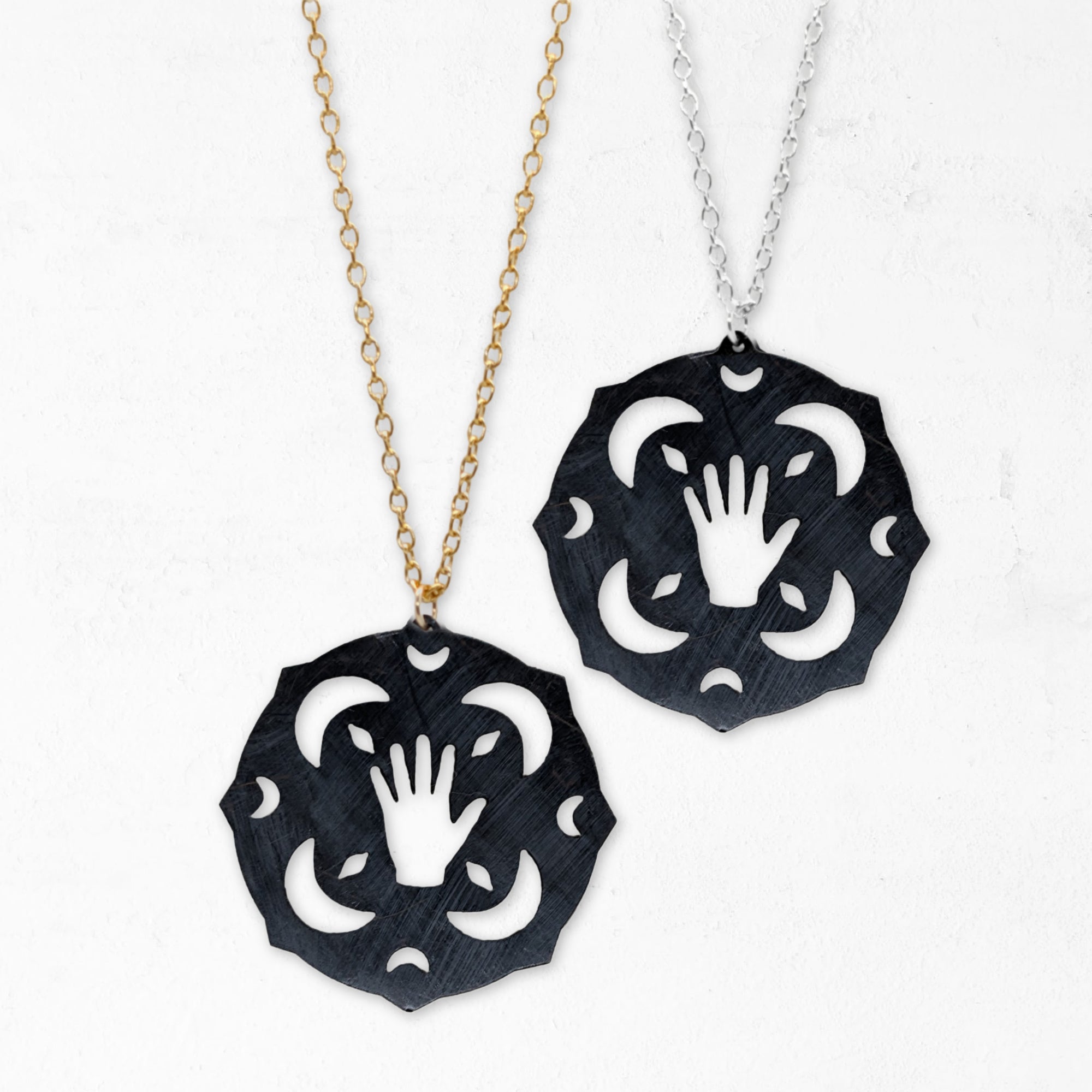 mandala necklace with tarot hand