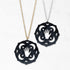 mandala necklace with tarot hand